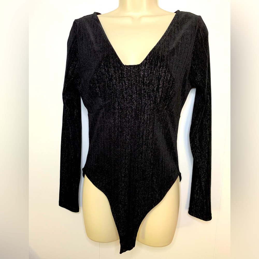 NWOT.  SO medium (fits like a small) black shiny bodysuit